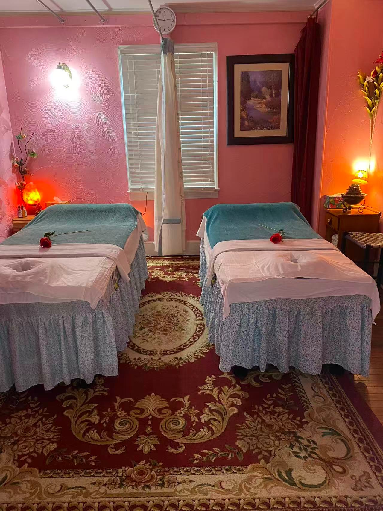 Tranquil massage therapy room with warm lighting